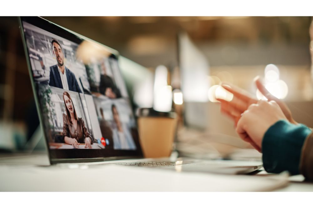 Conference Meeting Online and Discussing Business Project