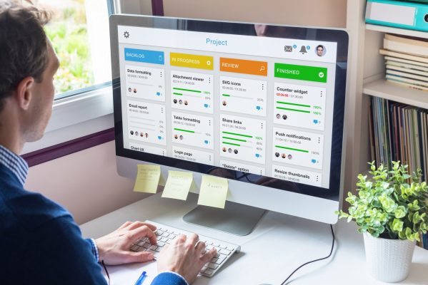 Manager working with agile product development using scrum or ka Manager working with agile product development using scrum or kanban methodology